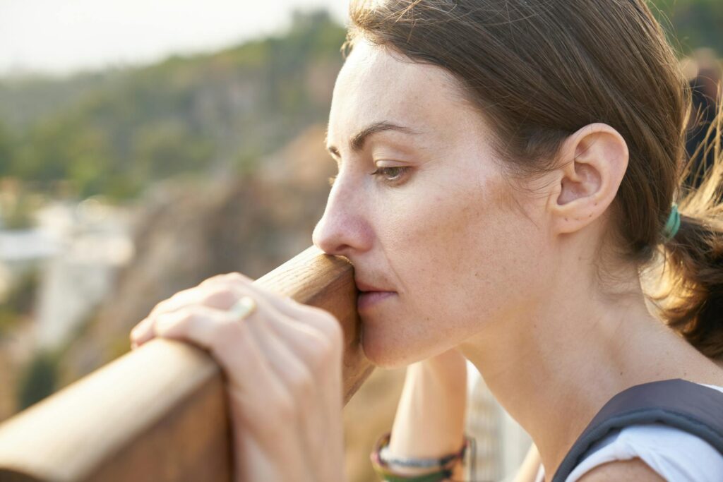 conditions 
Processing Traumatic Memories: woman standing in front of brown wood plank