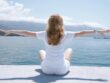 How to Manage Stress? Neuro Emotional Technique on Chronic Low Back Pain.:mphoto of woman sitting near body of water